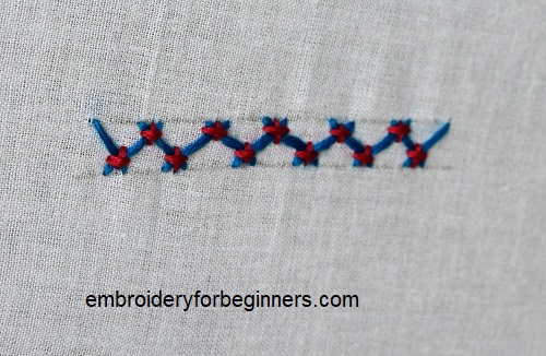 completed tacked herringbone stitch