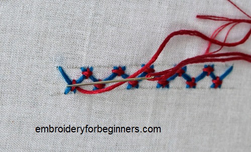 completing the tacked herringbone stitch