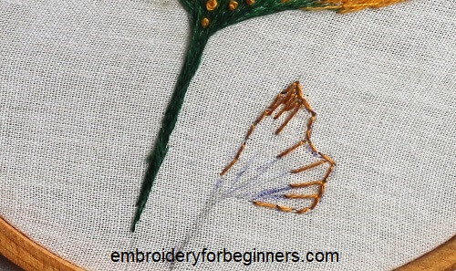 embroidering the long and short stitch