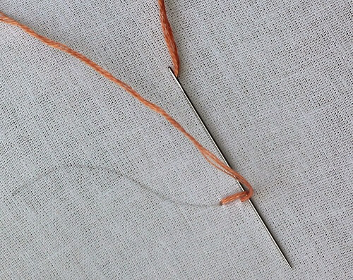 passing the thread under the stem stitch