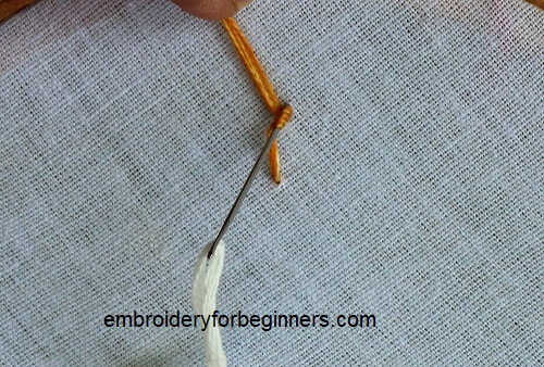 taking the thread down for the long french knot