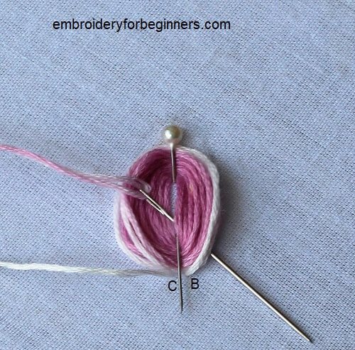 working on the looped stitch