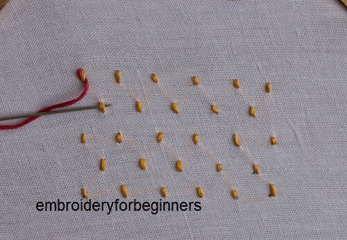 3. starting to weave the contrast floss